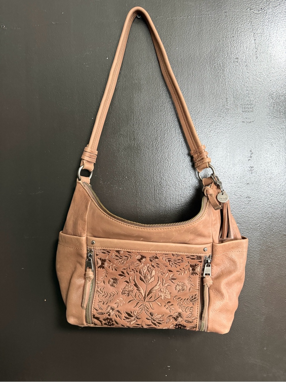 The Sak Tan Leather Shoulder Bag with Floral embroidered Cut Front
